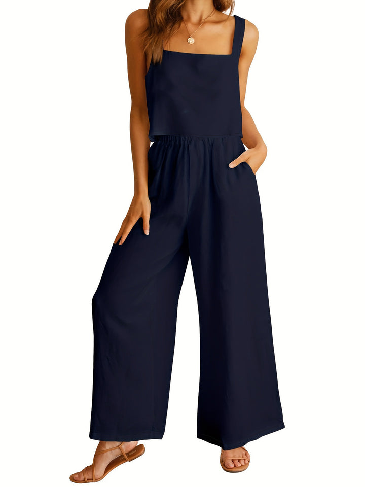 Dame bred jumpsuit med elegant snit og elastisk taljebånd Stilla