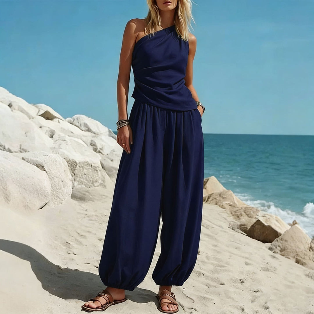 Damer Elegante Én-delt Outfit med Flydende Snit og One-Shoulder Design Skovae