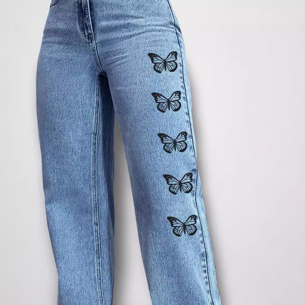 Dame bred denim-bukser med legende sommerfuglemotiver Stilla