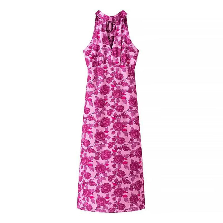 Dame maxikjole med floral trykdesign og elegant split Stilla