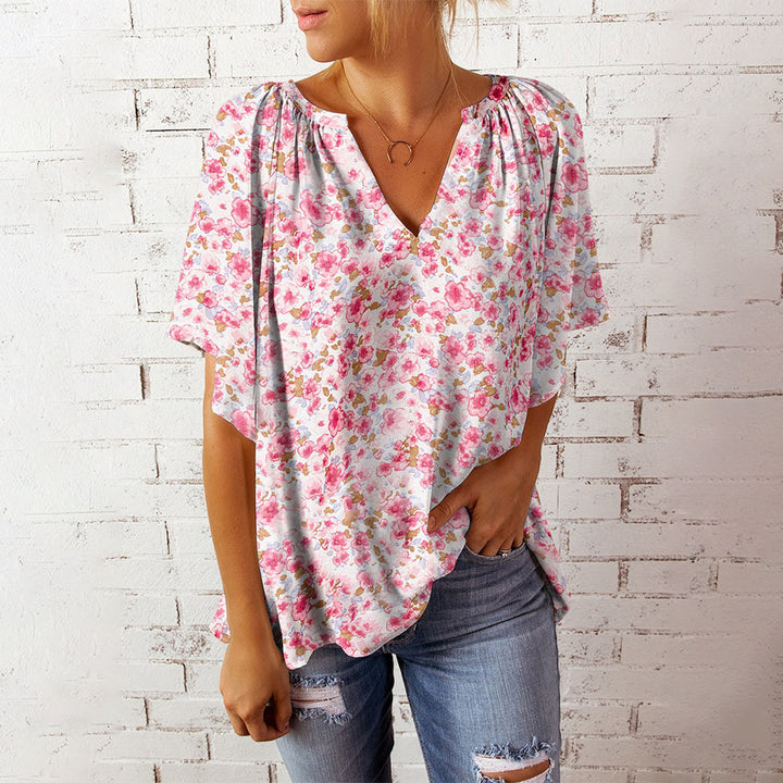 Damebluse med blomstermønster og V-hals Stilla