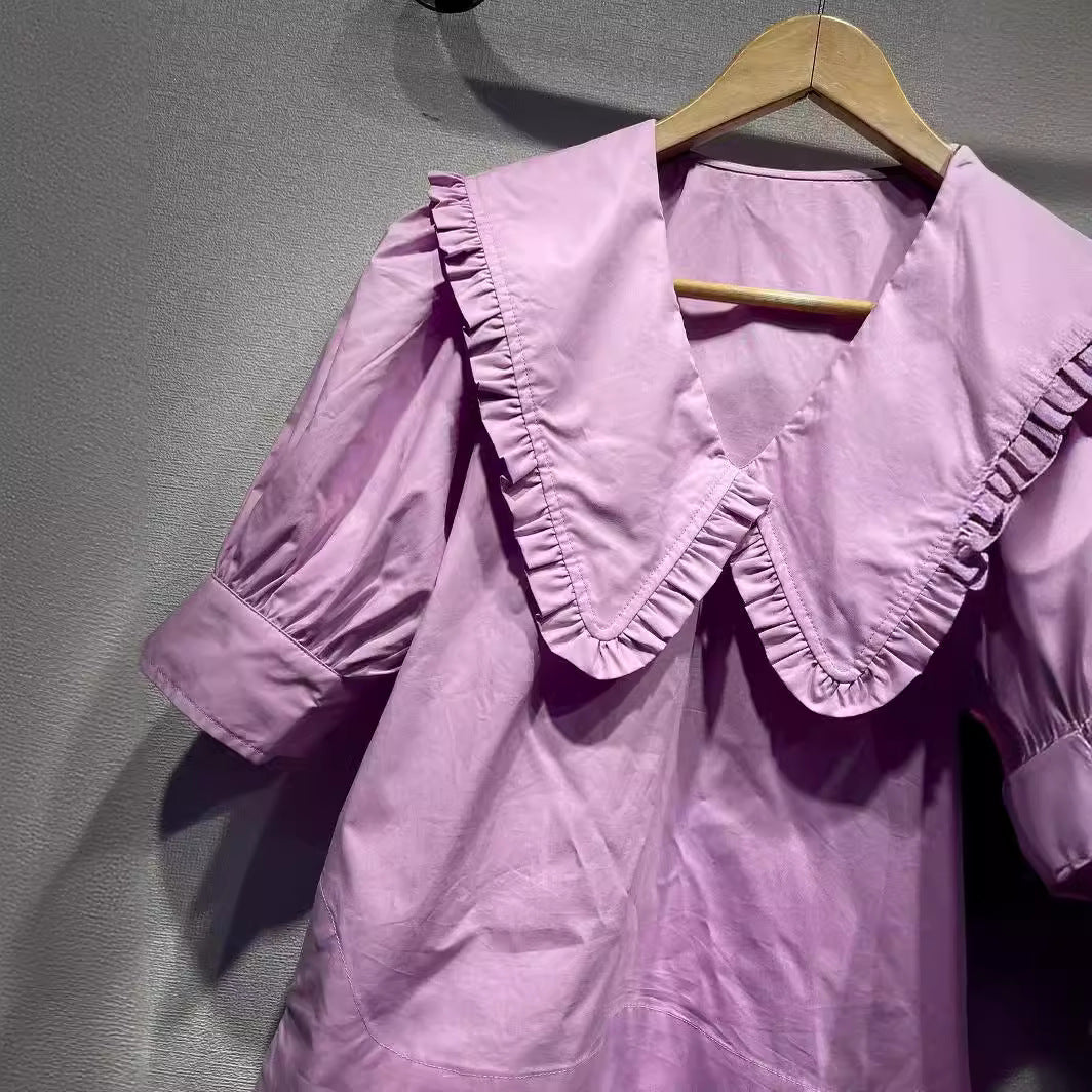 Damebluse med voluminøs krave og flæsedetaljer Stilla