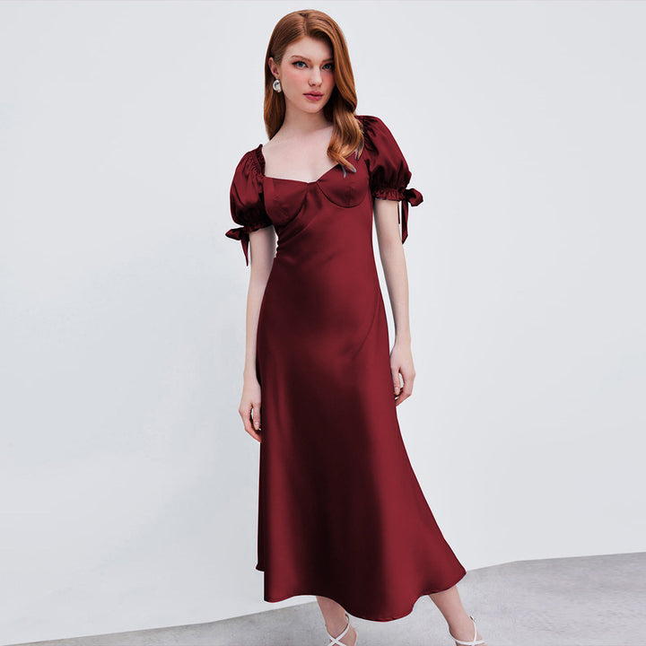 Dame midi kjole med elegante pufærmer og chic V-hals Stilla