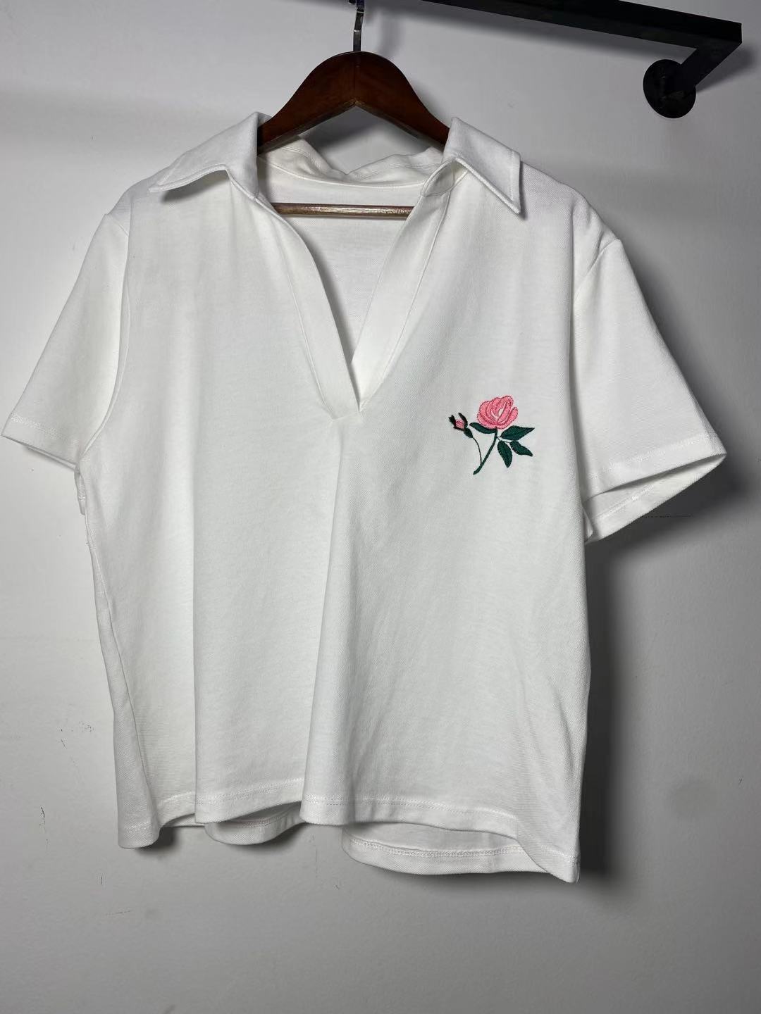Dame polo T-shirt med blomster broderi Stilla