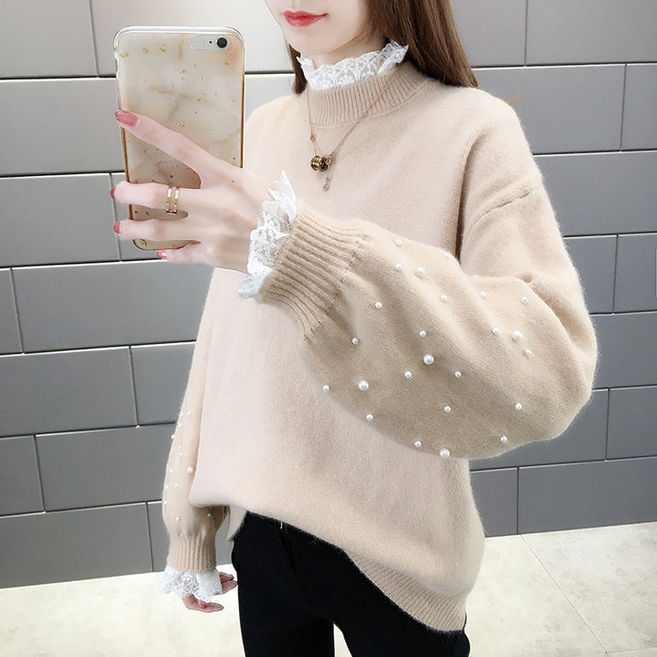Dame trendy strikpullover med perledetaljer og voluminøse ærmer Stilla