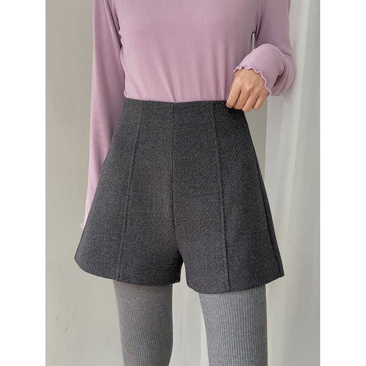 Dame shorts i det elegante houndstooth-mønster med høj talje og folder Stilla