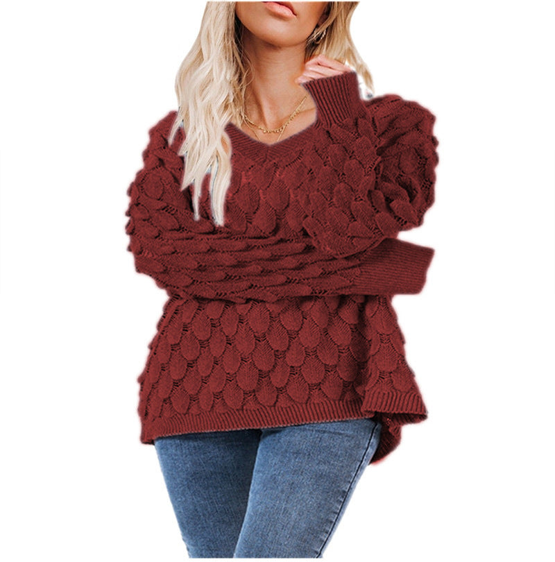 Kvinders chunky strikket sweater med skulpturel bølgemønster og V-hals Stilla