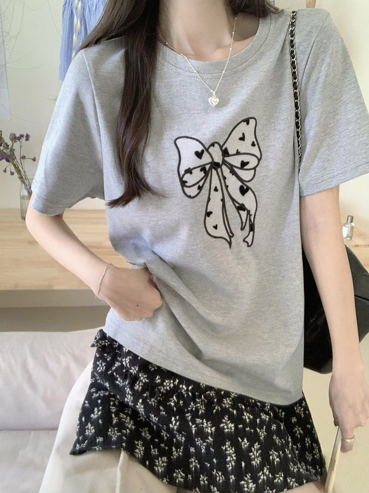 Femme Legende Sløjfe Grafik T-Shirt Stilla