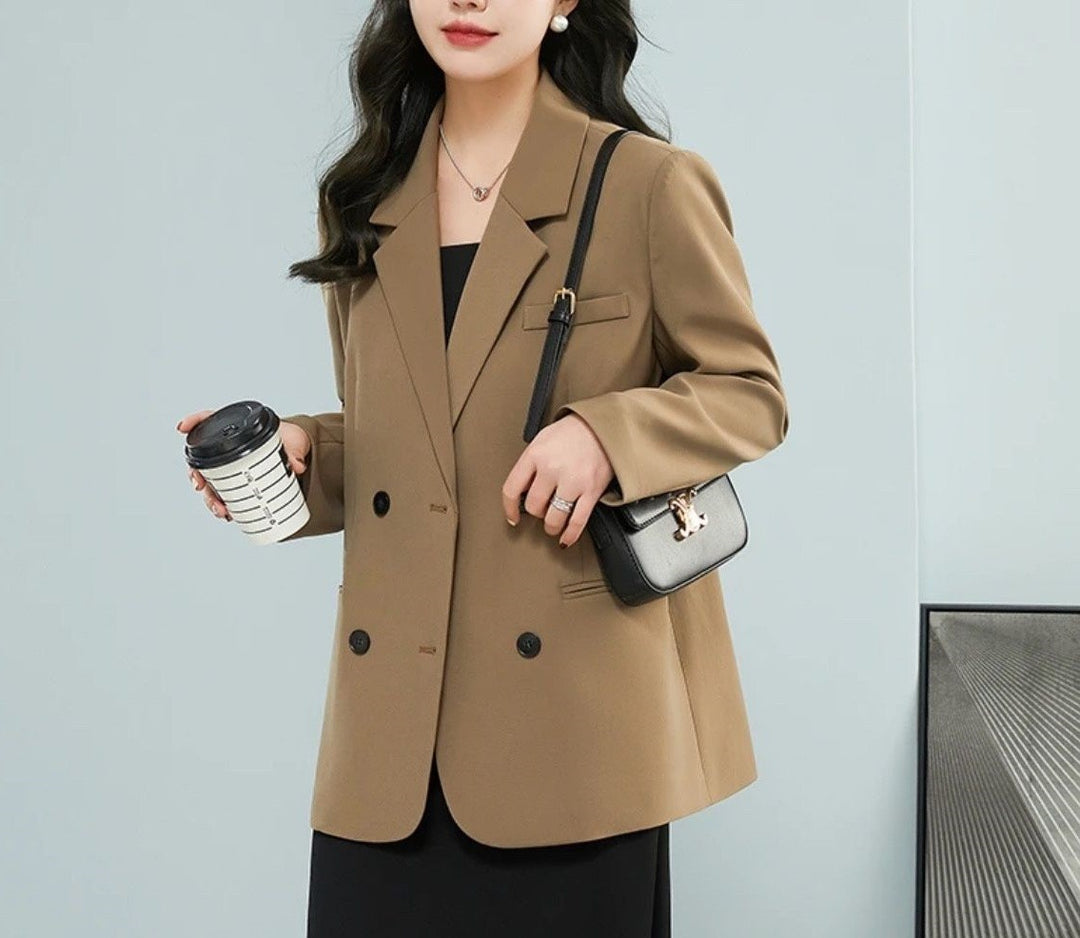 Kvinders stilfulde oversized blazer med dobbelt knapfane og stilfulde detaljer Stilla