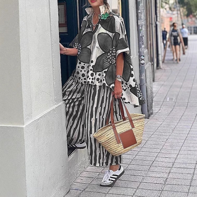 Dame fritidsbluse med moderne blomsterprint og afslappet snit Stilla