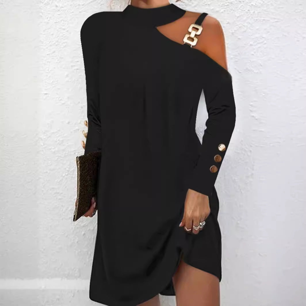 Damekjole med moderne cut-out-detaljer og elegante knapapplikationer Stilla