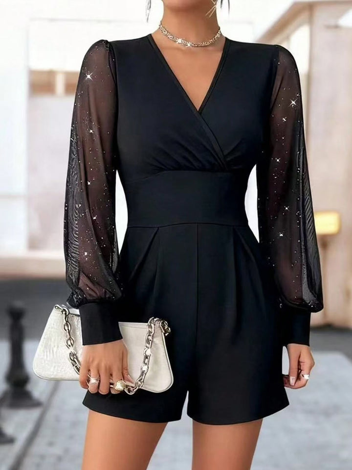 Dame elegant jumpsuit med gennemsigtige pufærmer og V-udskæring Skovae