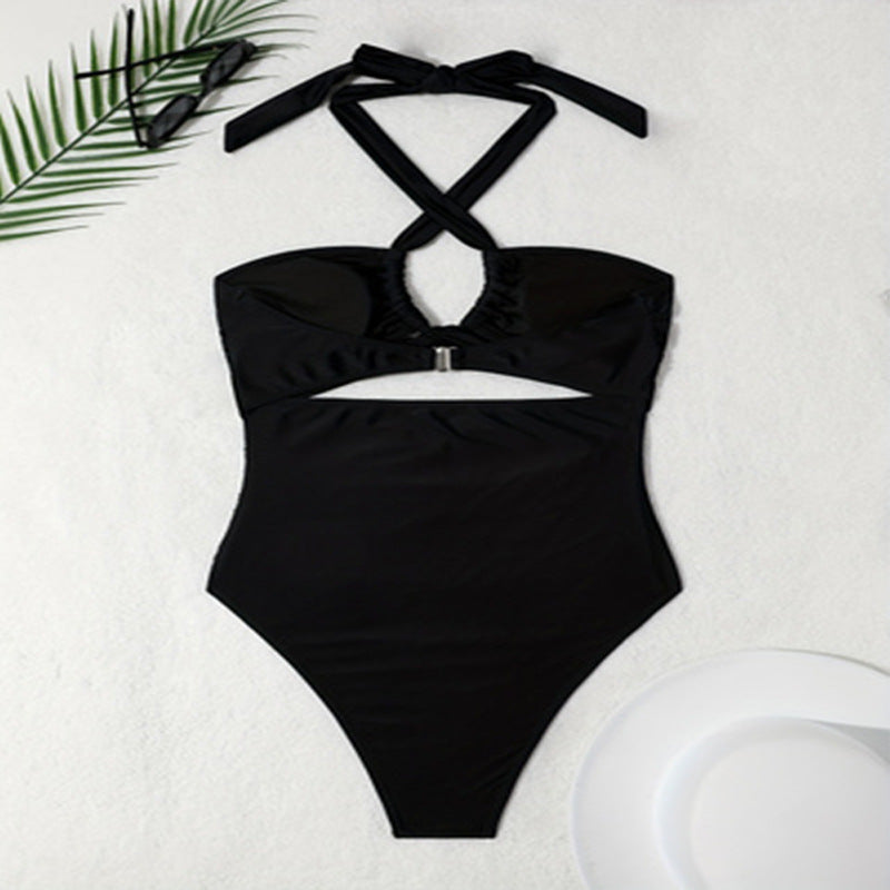 Dame Én delers badedragt med raffineret indpakningsdesign og elegant cut-out Skovae