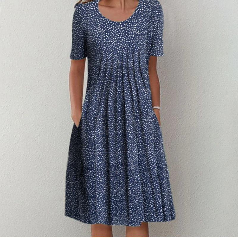 Dame fritidskjole med blomstret design og praktiske lommer Stiila