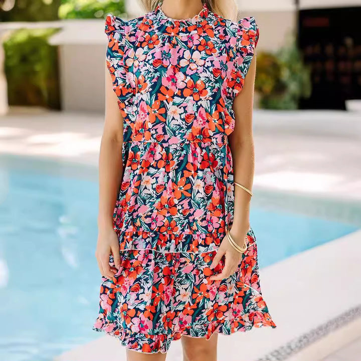 Dame sommerligt tunika-kjole med flæsedetaljer og blomstret design Stilla