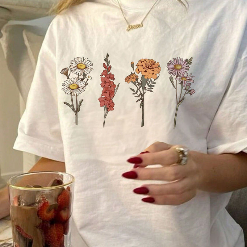Dame T-shirt med floralt tryk Stilla