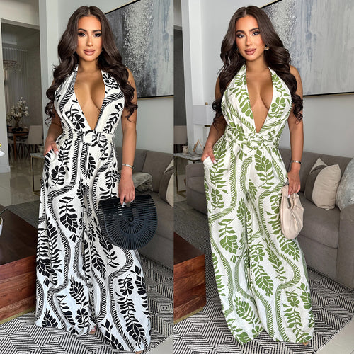 Dame Elegant og luftig Jumpsuit med dyb udskæring og blomstermuster Stilla