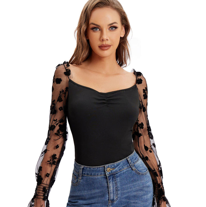 Dame Body med blomsterpuffærmer og elegant design Stilla