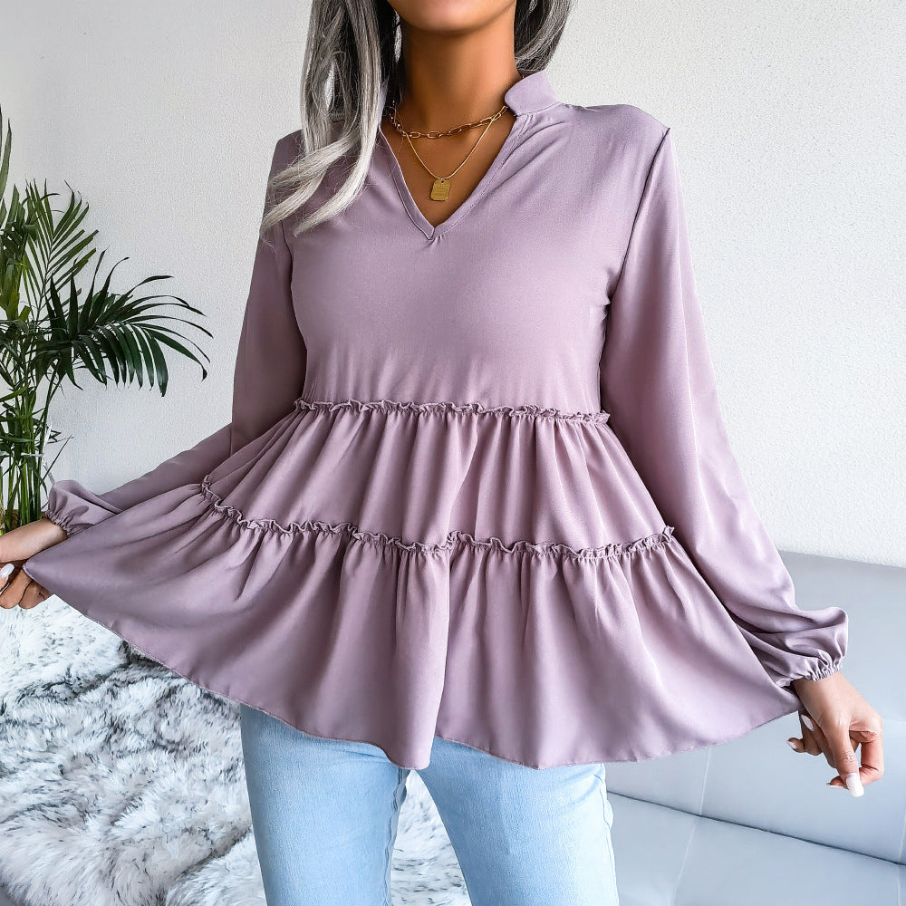 Damebluse med flerfarvet design og voluminøst snit Stilla