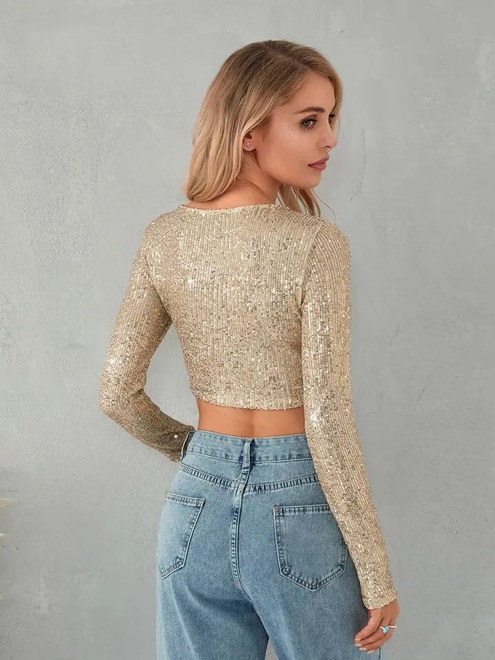 Dame Glitrende Cropped-Top med lange ærmer og funklende design Stilla