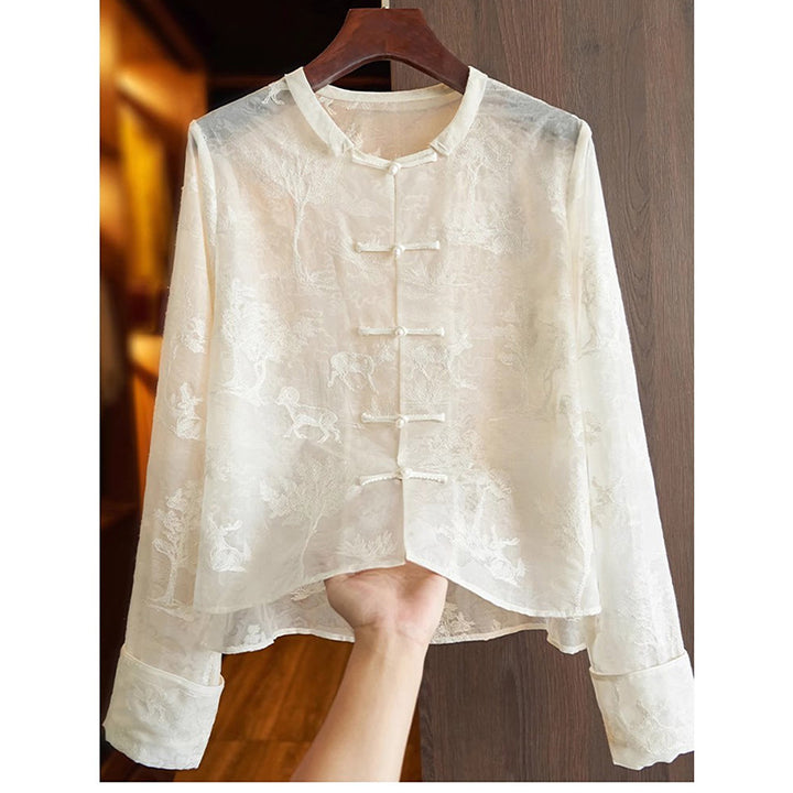 Damebluse med fin broderi og elegante knapdetaljer Stilla