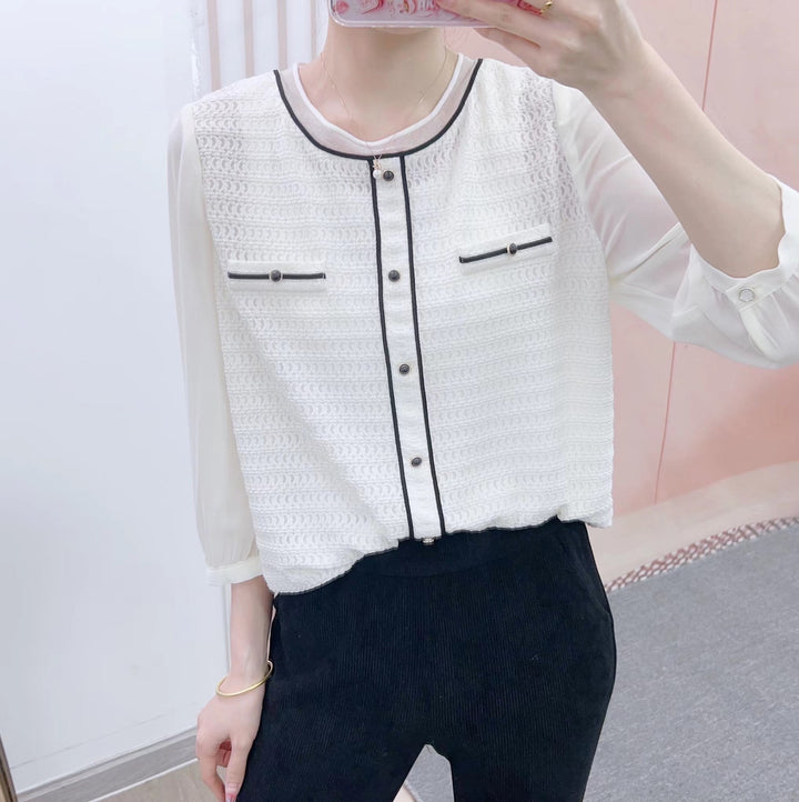 Damebluse med moderigtige indvævede mønster og elegante knapdetaljer Stilla