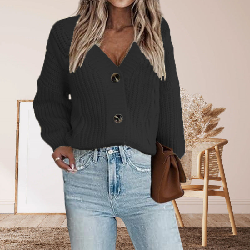 Kvindernes chunky strikket cardigan med knapdetaljer og voluminøse ærmer Stilla