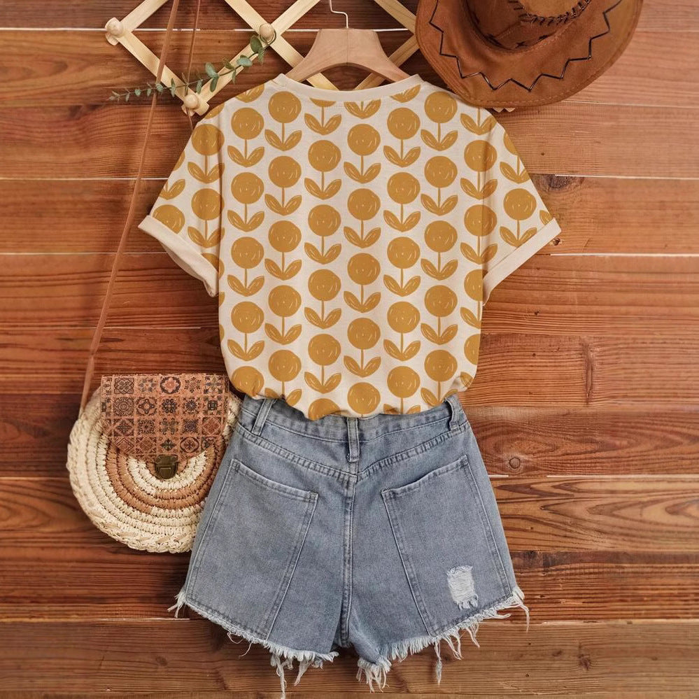 Dame T-shirt med blomstret print i trendy design Stilla