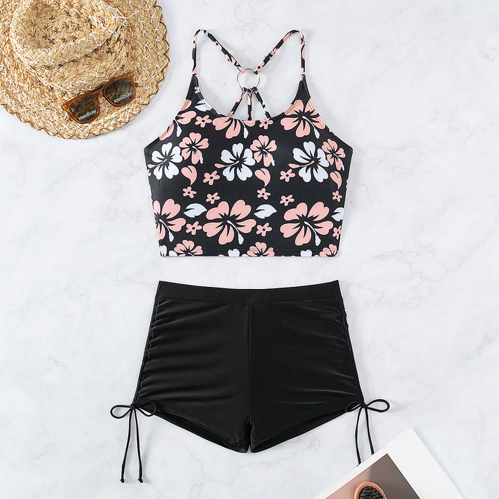 Dame badetop med blomsterdesign og højt skårne shorts Skovae