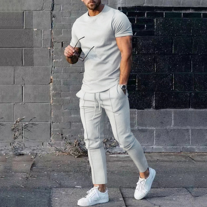 Herrer afslappet sport outfit med åndbart T-shirt og løs joggingbukser Stilla