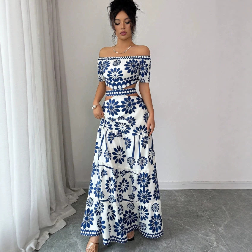 Dame maxikjole med blomstret design og trendy off-shoulder udskæring Skovae