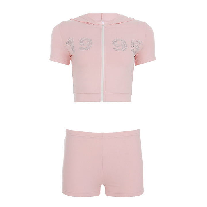 Dame sporty cropped hoodie-sæt med korte shorts og glansfulde accenter Skovae