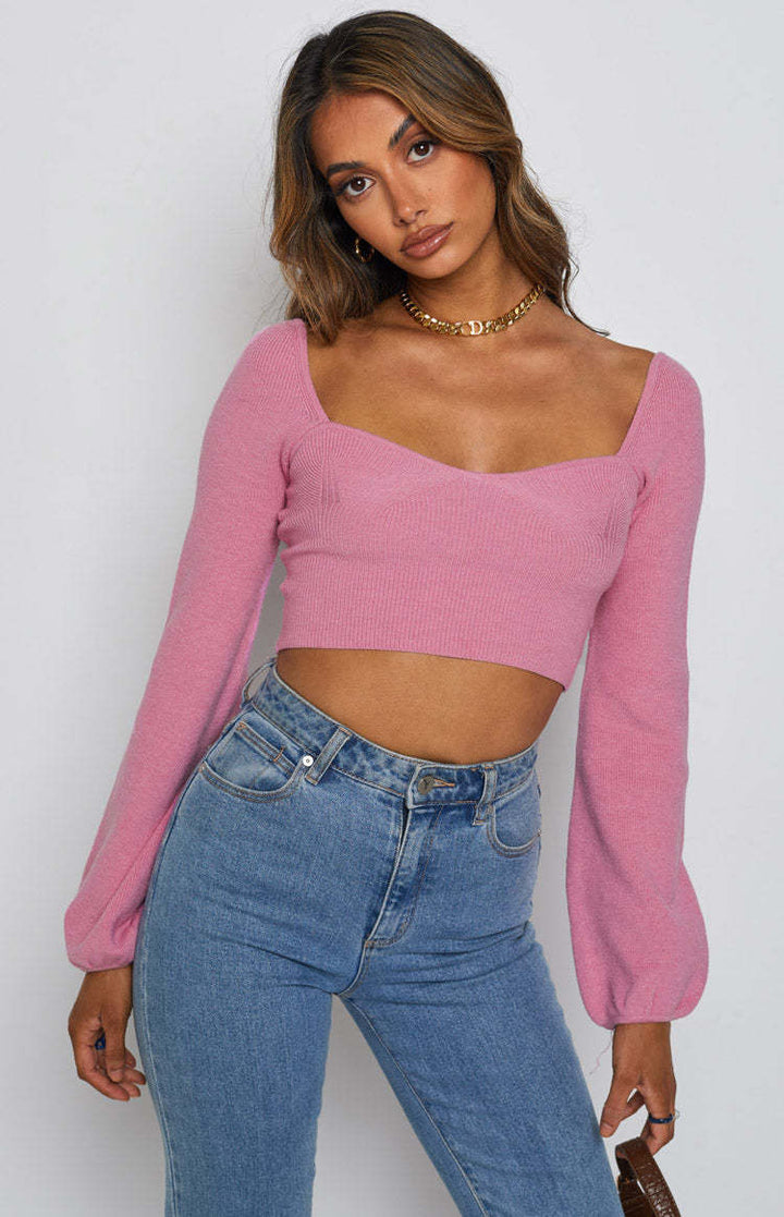 Damer elegant cropped top med smart ribstruktur og brede ærmer Skovae