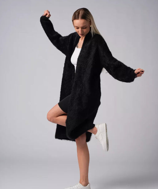 Kvinders Lange Strik Cardigan lavet af hyggeligt materiale med et elegant snit Stilla