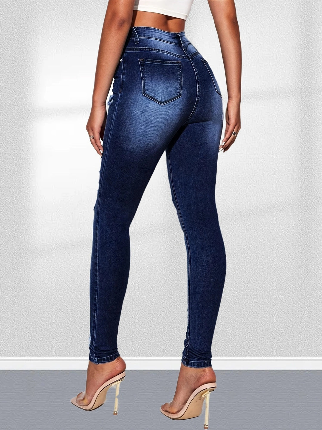 Dame højtaljede skinny jeans i den trendy destroyed-look med fashionable rifte detaljer Stilla