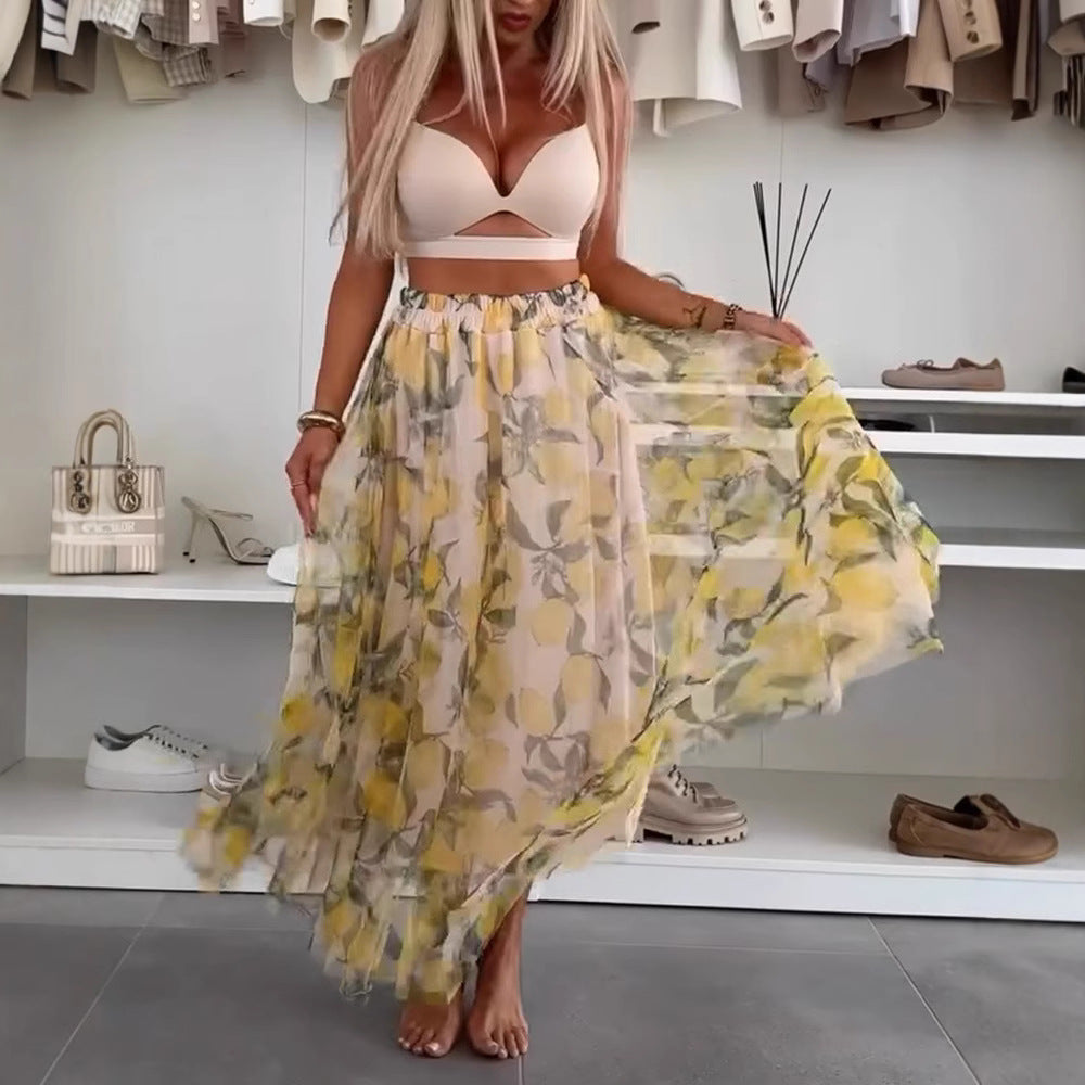 Dame Maxiskørt med florale lag og transparent design Stilla