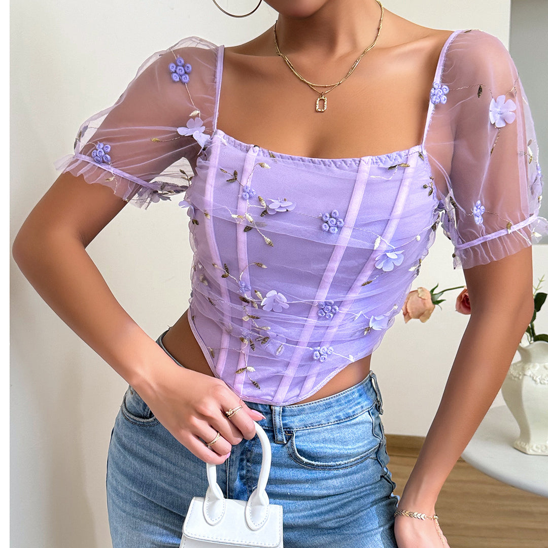 Damer elegant top med blomster-netærmer og flæsedetaljer Stilla