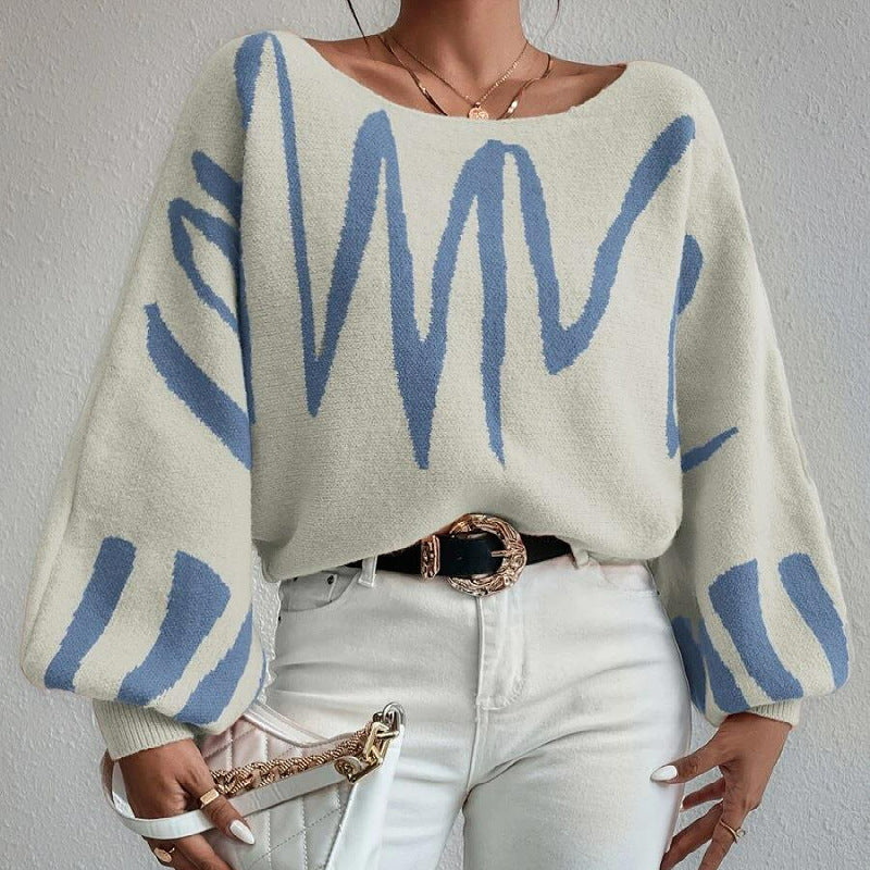 Kvinders oversized striktrøje med asymmetrisk design og afslappet halsudskæring Stilla