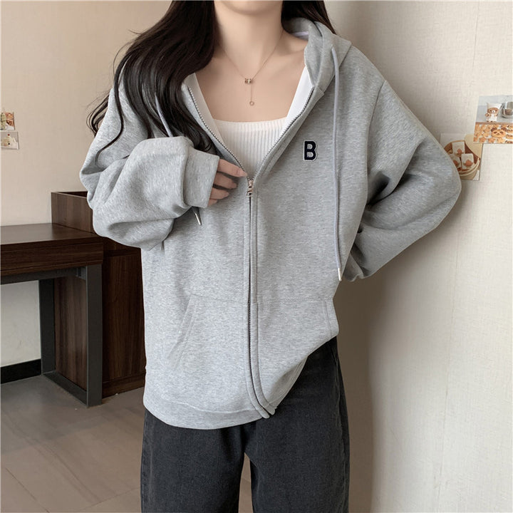 Femme Cozy Zip-Up Hættetrøje med funktionelle Kængurulommer Stilla