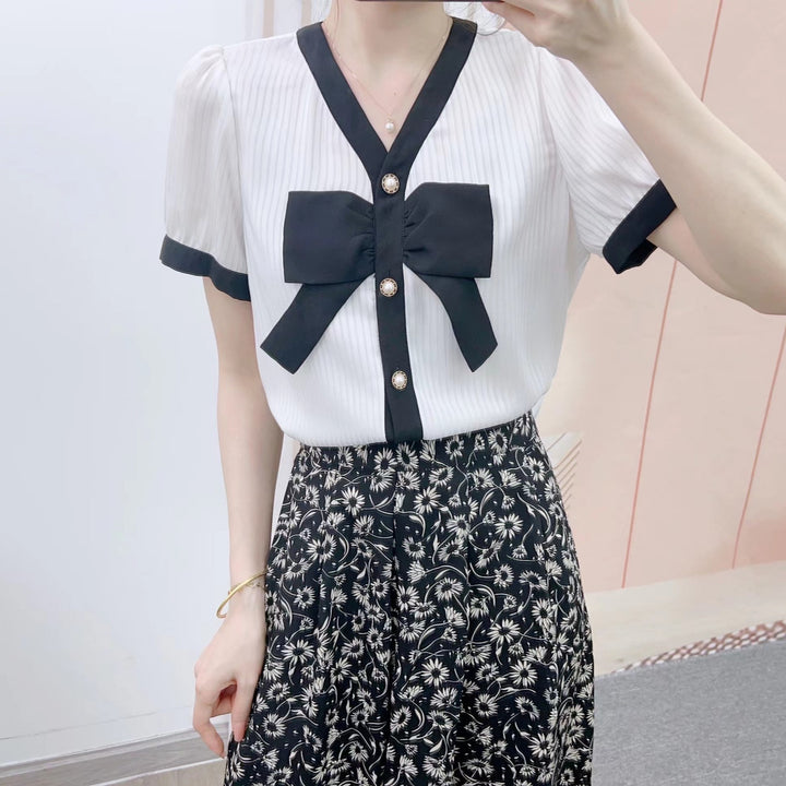 Dame Elegant Bluse med Sløjfeakcent og Blomsterprint Nederdel Stilla