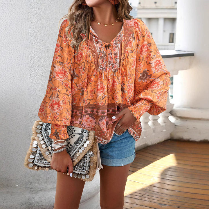 Dame Boho-bluse med florale detaljer Stilla