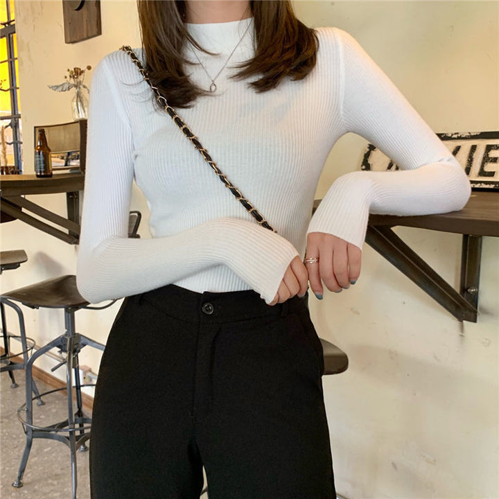 Dame mode højhalset sweater i ribstrik design Stilla