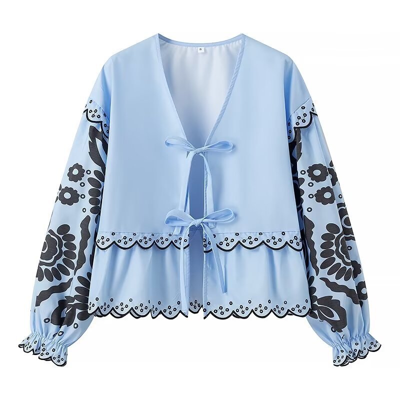 Dame let bluse med blomsterprint og taljebind Stilla