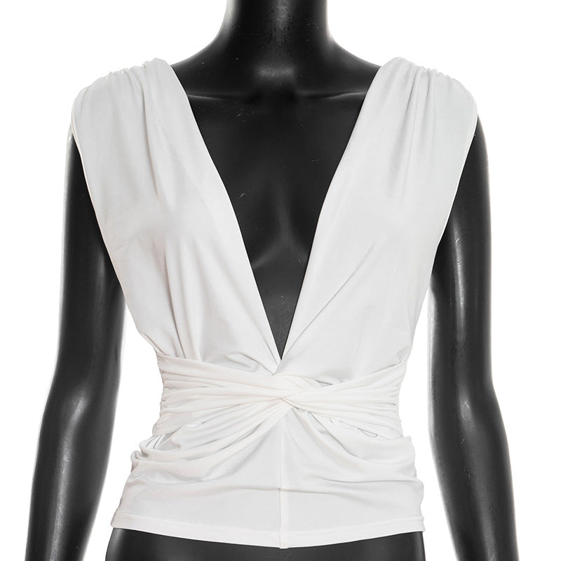 Dame wrap-top med dyb V-udskæring og elegant knudedetalje Skovae
