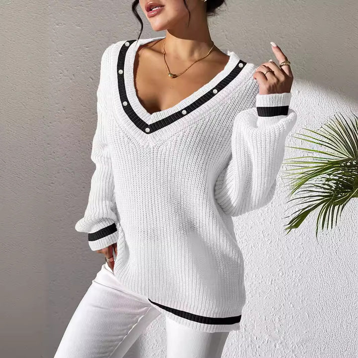 Dame oversized strikpullover med V-udskæring og elegante perledetaljer Stilla