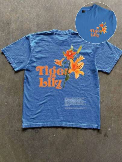 Dame T-shirt med kunstnerisk floraltryk og legende skrift Skovae