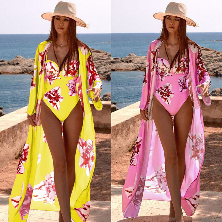 Dame Strandkimono med blomsterdesign og elegante flæseærmer Stilla