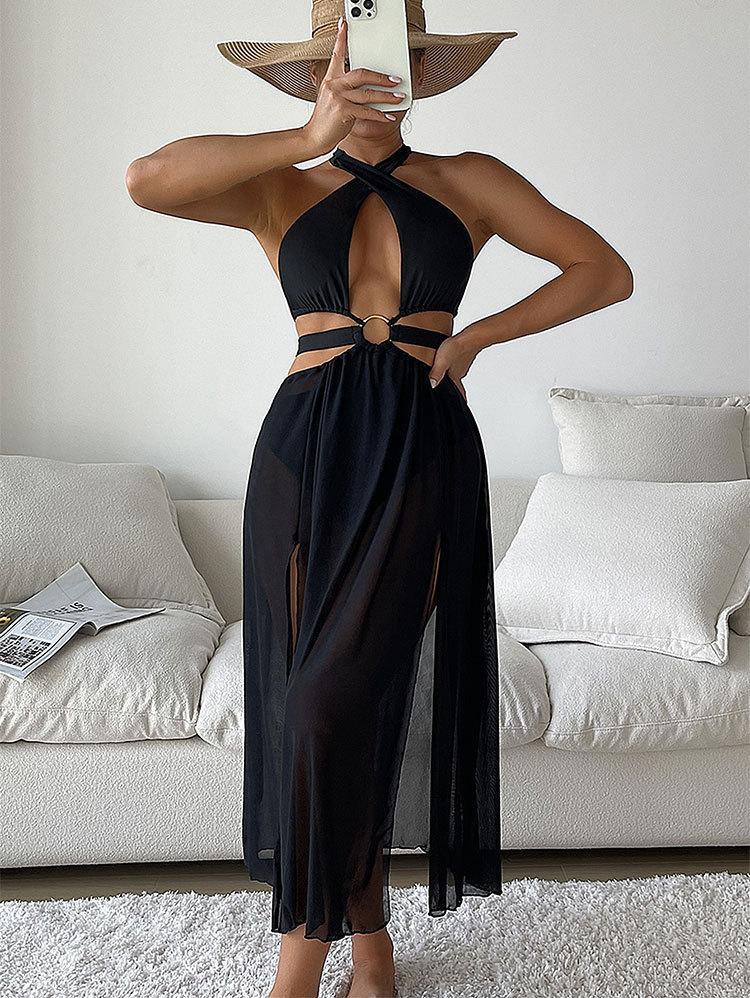 Dame badedragt med moderne cut-out, høj slids og elegant ringdetalje Skovae