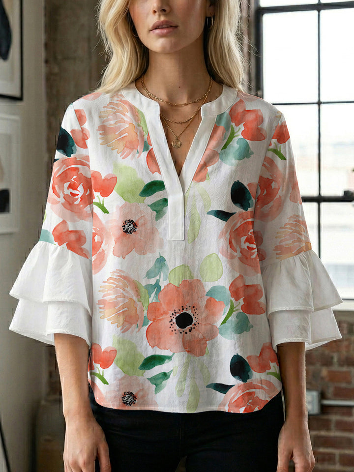Dame Elegant top med volumiøse puffærmer og floraltryk Skovae