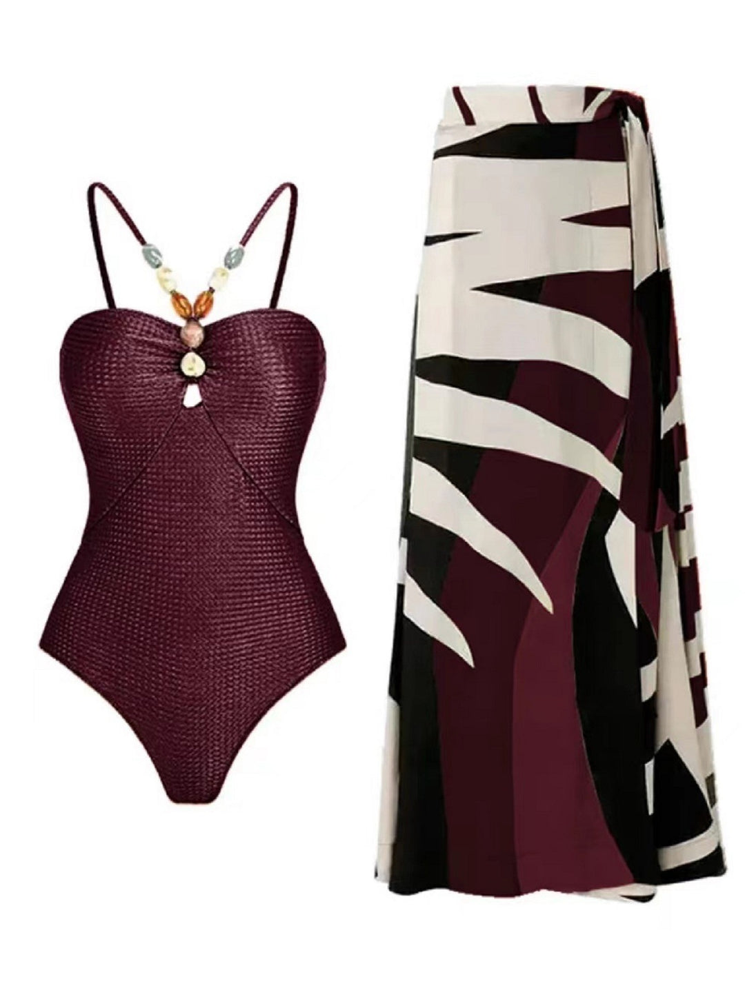 Dame badetøj med trendy cut-out og elegant indpakningsskørt Skovae